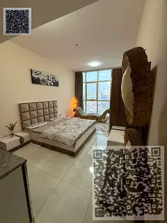 Studio apartment for monthly rent, including bills, with a panoramic street view.