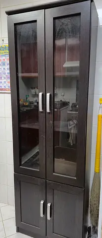 Tall dark wood display cabinet with glass doors - excellent condition - large space
