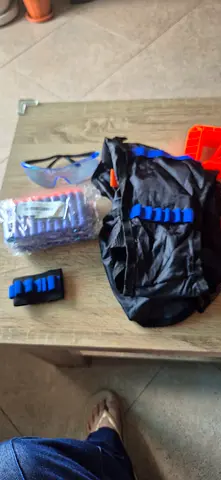 Nerf  Alpha strike with vest and glasses  spare bullets sparingly  Used