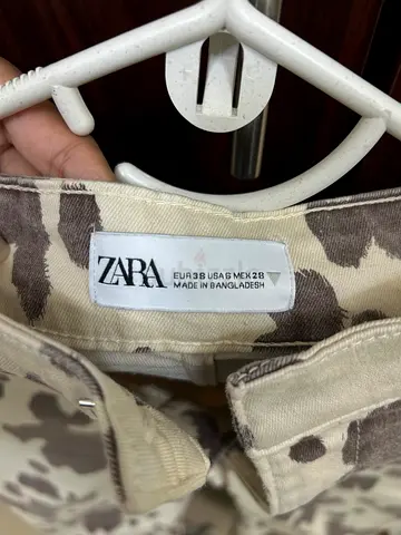 Zara Cow Print Flare Jeans (Size EUR 38 / USA 6)