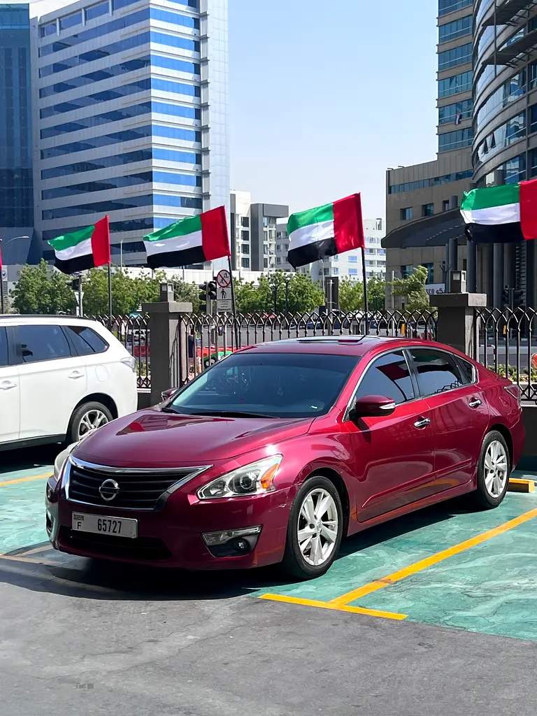 Nissan Altima 2014 — photo 1 of 15