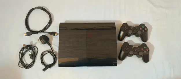 Sony PlayStation 3 Super Slim with 2 Controllers and Cables