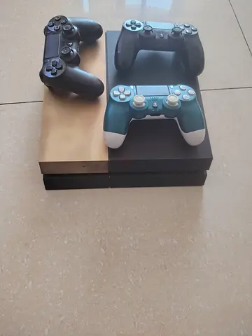 PlayStation 4  with 3 DualShock Controllers