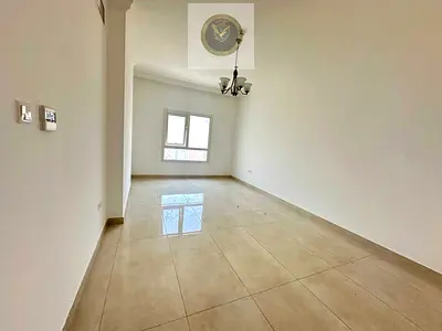 Second tenant two bedroom apartment and living room for annual rent in Al Majaz 2 Sharjah free parking two balconies modern finishing spacious layout