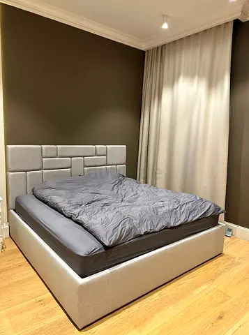 Queen fabric platform bed with padded headboard - excellent condition