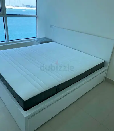 IKEA Malm king size bed frame with mattress.- Good Condition