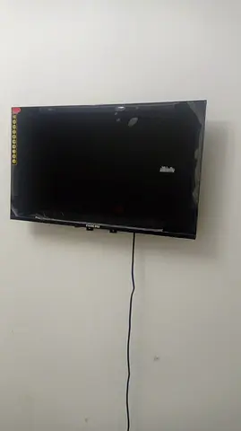 32-inch Wall-Mounted LED TV in Good Condition