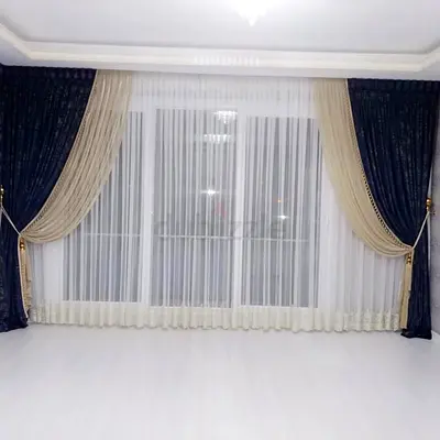 Full set of elegant navy and beige layered curtains with sheer inner panels