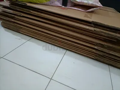 Bulk flattened cardboard boxes — good condition, ready for packing