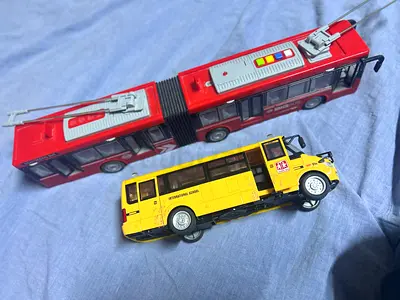 Set of 2 Toy Buses (Red Articulated Trolley + Yellow School Bus) - Used