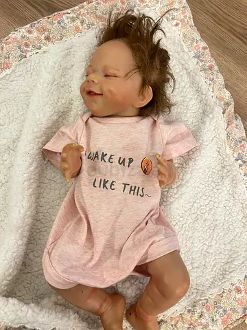 Realistic Baby Doll (reborn-style) with Outfit and Blanket