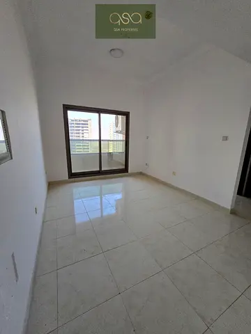 Two Bedroom Apartment With Parking Available For Rent In Paradise Lake Tower B9 Emirates City, Ajma