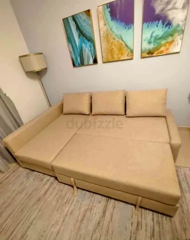 Ikea L Shape Sofa cum bed with big storage in L