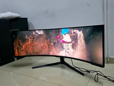 The Samsung Odyssey Neo G9 (LS57CG952NUXEN) is a 57-inch, 1000R curved gaming monitor featuring Dual