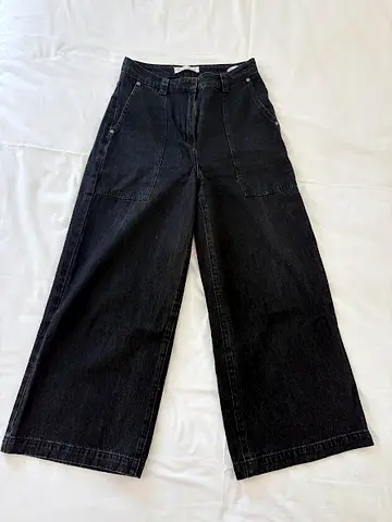 Black wide-leg denim trousers, gently used