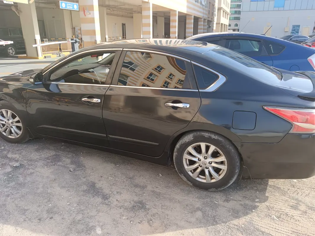 Nissan Altima 2015 — photo 1 of 6