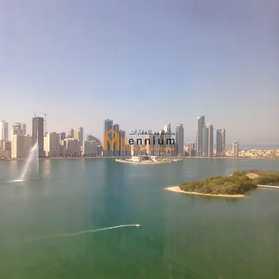 For rent in Al Majaz 1, a 3-bedroom apartment with a living room, 1500 sq ft, with a stunning water