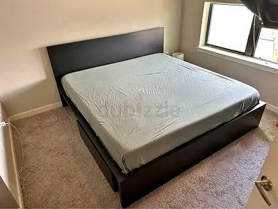 IKEA Malm king size bed frame with mattress.