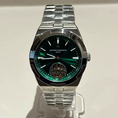 Vacheron Constantin mens stainless steel watch with green dial and visible tourbillon Atometic