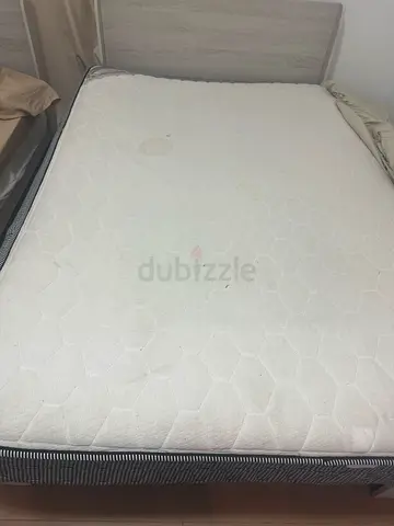 Used double mattress in good condition (with minor stains) - UAE