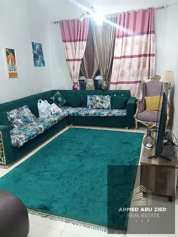 Furnished one-bedroom apartment with new and clean furniture for monthly rent in Ajman, City Towers, with parking. Prime location in Al Nuaimiya 3, op
