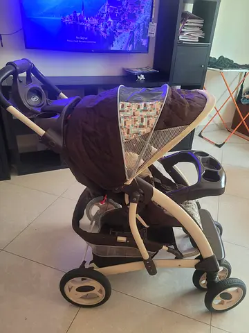 Used baby stroller/pram in good condition - reversible seat slightly negotiable