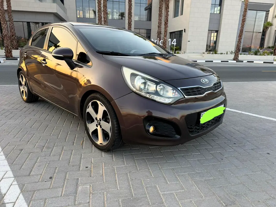 Kia Rio 2015 — photo 1 of 19
