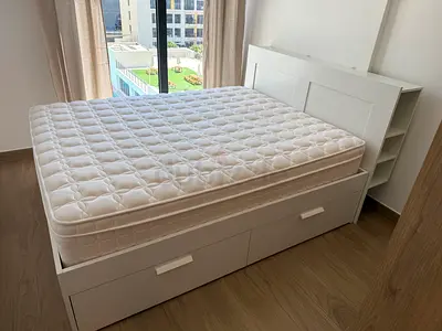 White storage bed frame with mattress