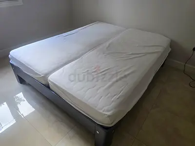 King size bed frame with two single mattresses (can be used as split) - good condition