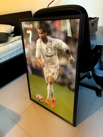 Ronaldo poster in frame
