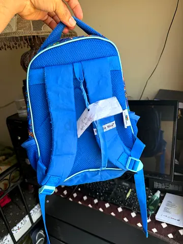 Used blue toddler backpack with padded straps — lightweight school bag