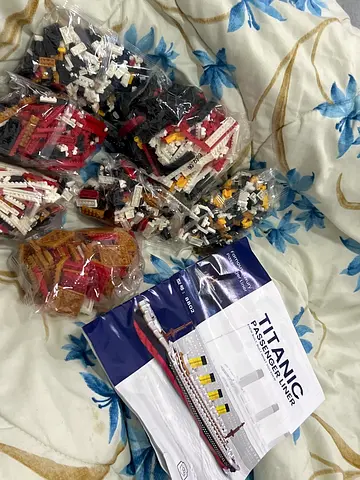 Lego Titanic micro building blocks set with instruction manual — new parts in bags