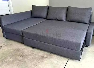 Gray L-shaped Sofa Bed with Storage - Good Condition