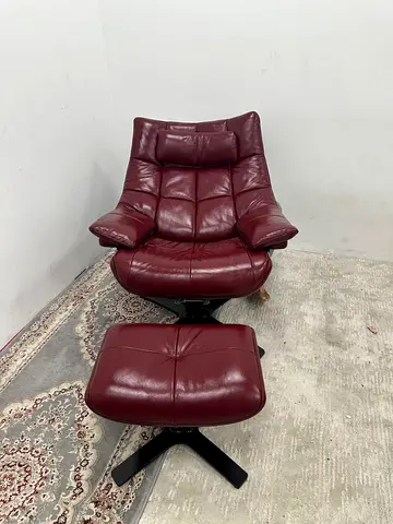 Pure leather natuzzi arm chair with footstool