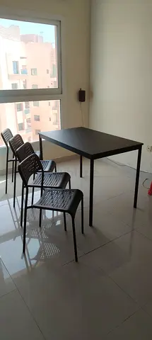 Ikea Modern Black Dining Table with 4 Matching Chairs