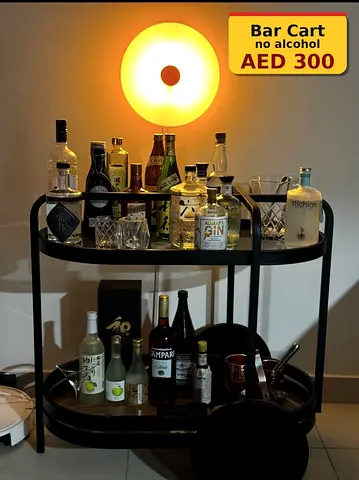 Black Metal Bar Cart with Wheels – Good Condition, AED 300