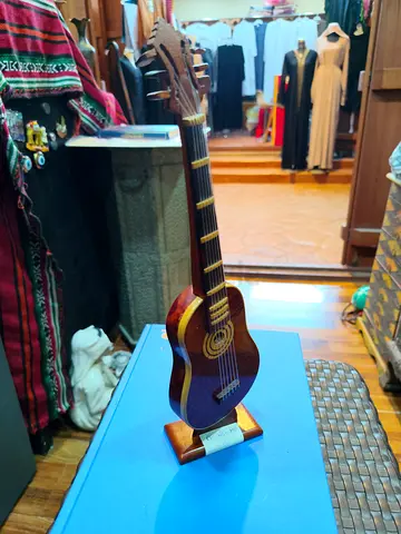 Decorative wooden miniature guitar on stand - 34cm Tall