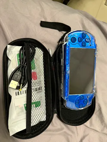 Sony PSP in blue with case , protector case screen guard and charger - modded with games