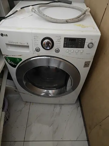 LG front-load washer dryer (8kg wash / 6kg dry) - used, working