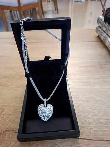 Necklace with heart pendant.