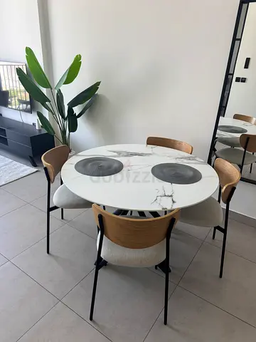 Round Marble-Top Dining Table with 4 Modern Chairs - Home Center