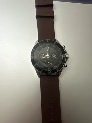 Mens brown leather strap wristwatch with chronograph-style dial