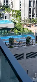One-bedroom apartment for annual rent in Al Jadeh, with a pool view.