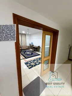 Two furnished rooms and a living room for monthly rent in Al Nuaimiya 3, Khalifa Main Street, opposi