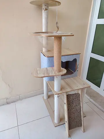Multi-level wooden cat tree with scratching posts and condo - good condition