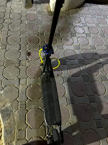 Black Electric Scooter with yellow design