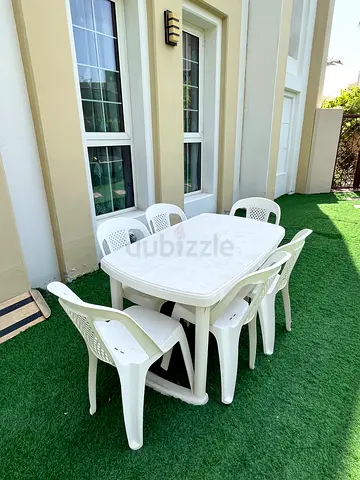 White Outdoor Plastic Garden Table with 6 Matching Chairs