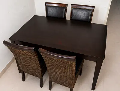 Solid Dark Wood 4-Seater Dining Table with Woven Back Chairs