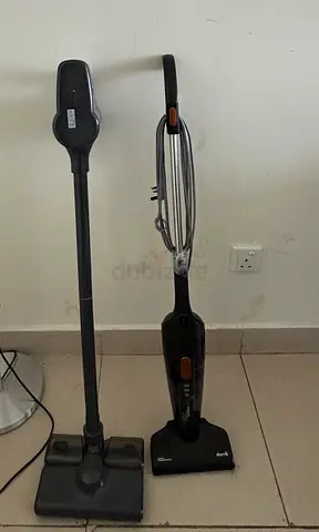 Two lightweight stick vacuums — one cordless stick and one corded