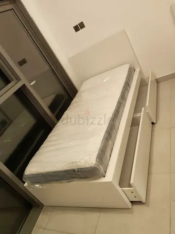 Malam single  bed 90/200cm bed and Ikea mattress is available in excellent condition,